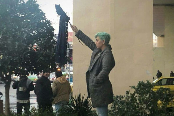 Iranian women take off headscarves to protest veil law