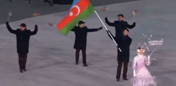 Patrick Brachner carries Azerbaijan's flag in Winter Olympics Opening Ceremony - VIDEO