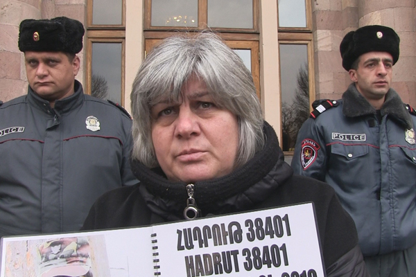 Mother of dead Armenian soldier holds solo protest outside government building