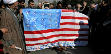US flag burnt in Iranian parliament