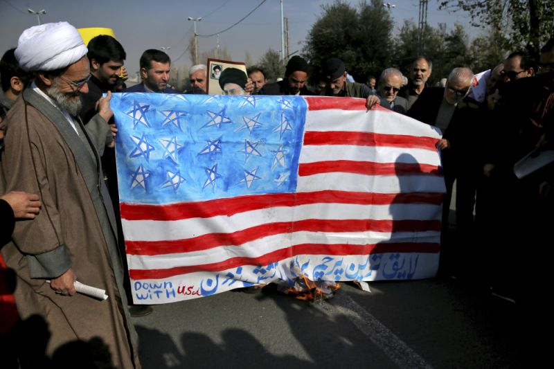 US flag burnt in Iranian parliament