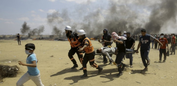 At least 52 Palestinians killed by Israeli army at Gaza border