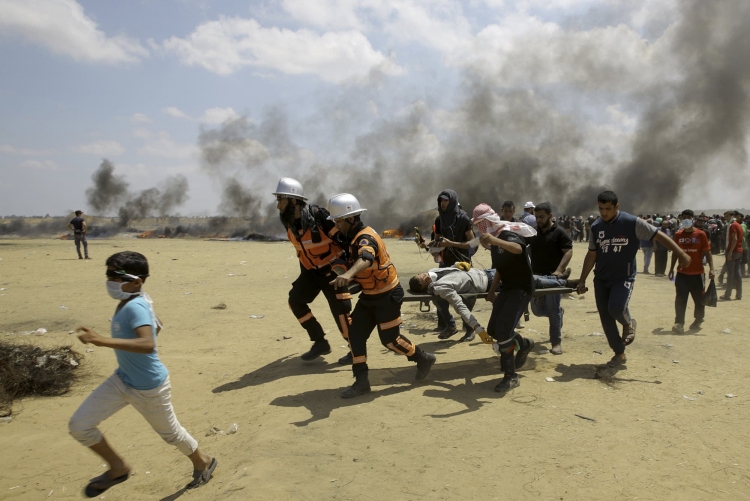 At least 52 Palestinians killed by Israeli army at Gaza border