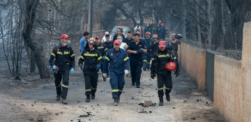 Death toll in wildfires near Athens rises to 74