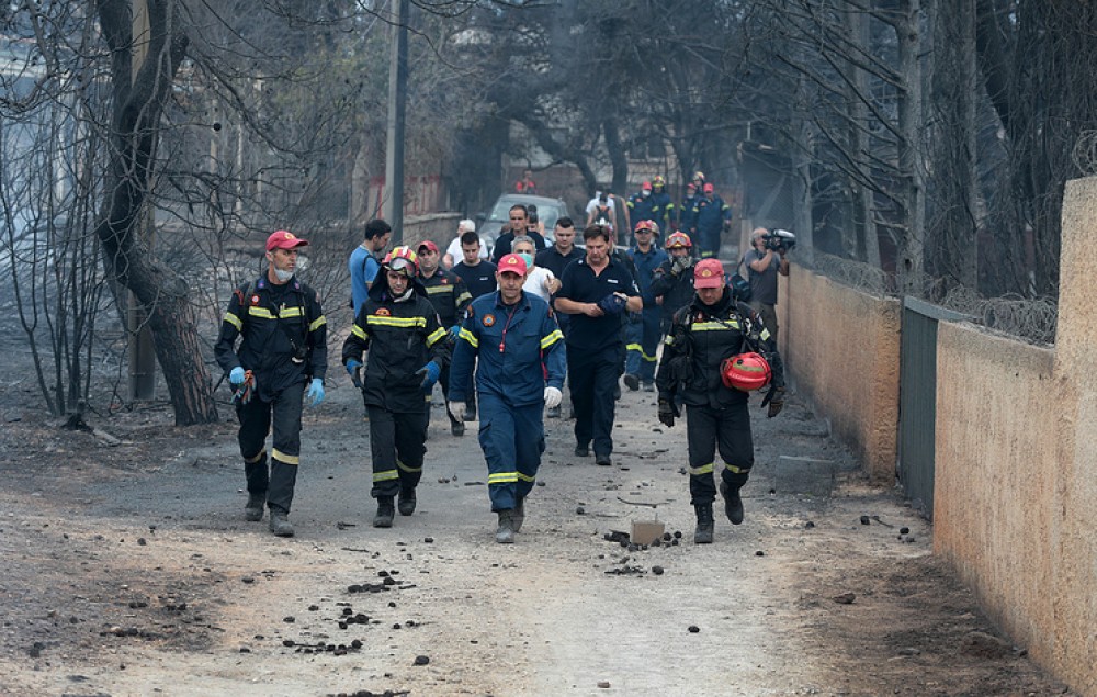 Death toll in wildfires near Athens rises to 74
