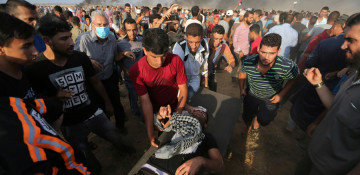 Paramedic on duty among two killed by Israeli fire in Gaza, 121 more injured
