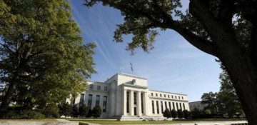 Fed raises rates, sees at least three more years of economic growth