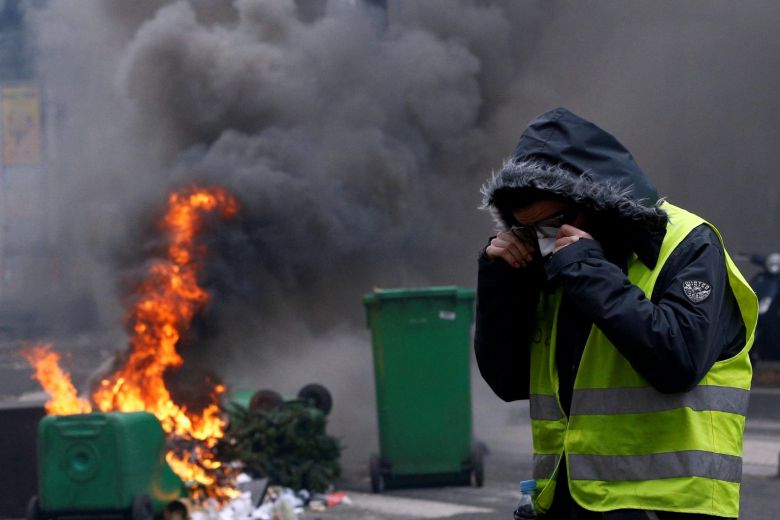Macron announces economic state of emergency as yellow vests protests continue