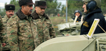 Azerbaijani defense minister checks combat readiness of armored vehicles deployed in frontline zone 
