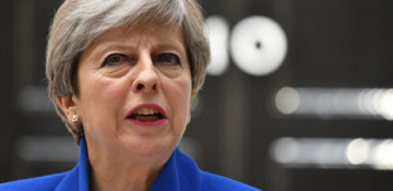 Britain's May says she will quit if her Brexit deal passes