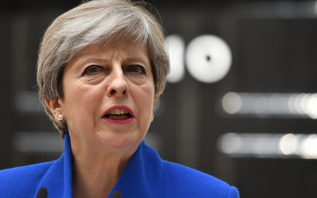 Britain's May says she will quit if her Brexit deal passes