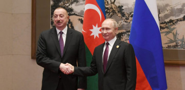 Azerbaijani, Russian presidents meet in Beijing 