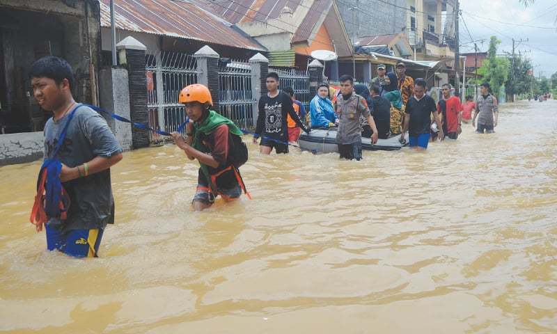 Death toll from Indonesia's floods, landslides climbs to 31