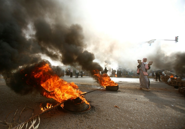 13 dead as Sudan military rulers break up sit-in