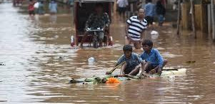 Millions stranded in India as early monsoon downpours bring flood havoc