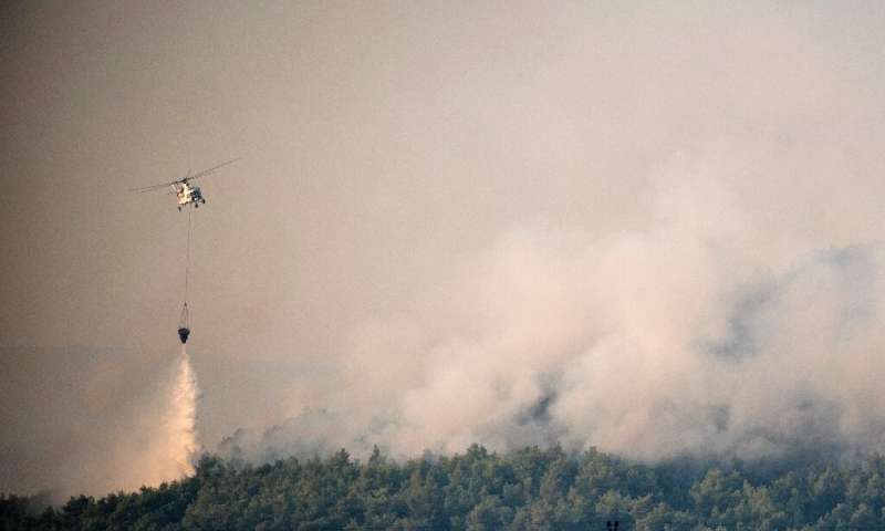Ecological disaster on Greek island as fire burns on