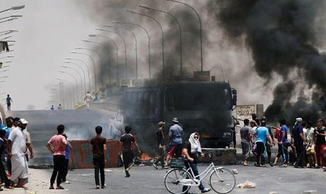 Iraqi PM declares curfew in Baghdad amid protests