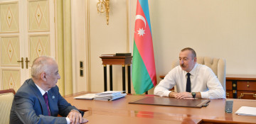 President Ilham Aliyev receives Deputy PM Hajibala Abutalibov as he submitted his resignation
