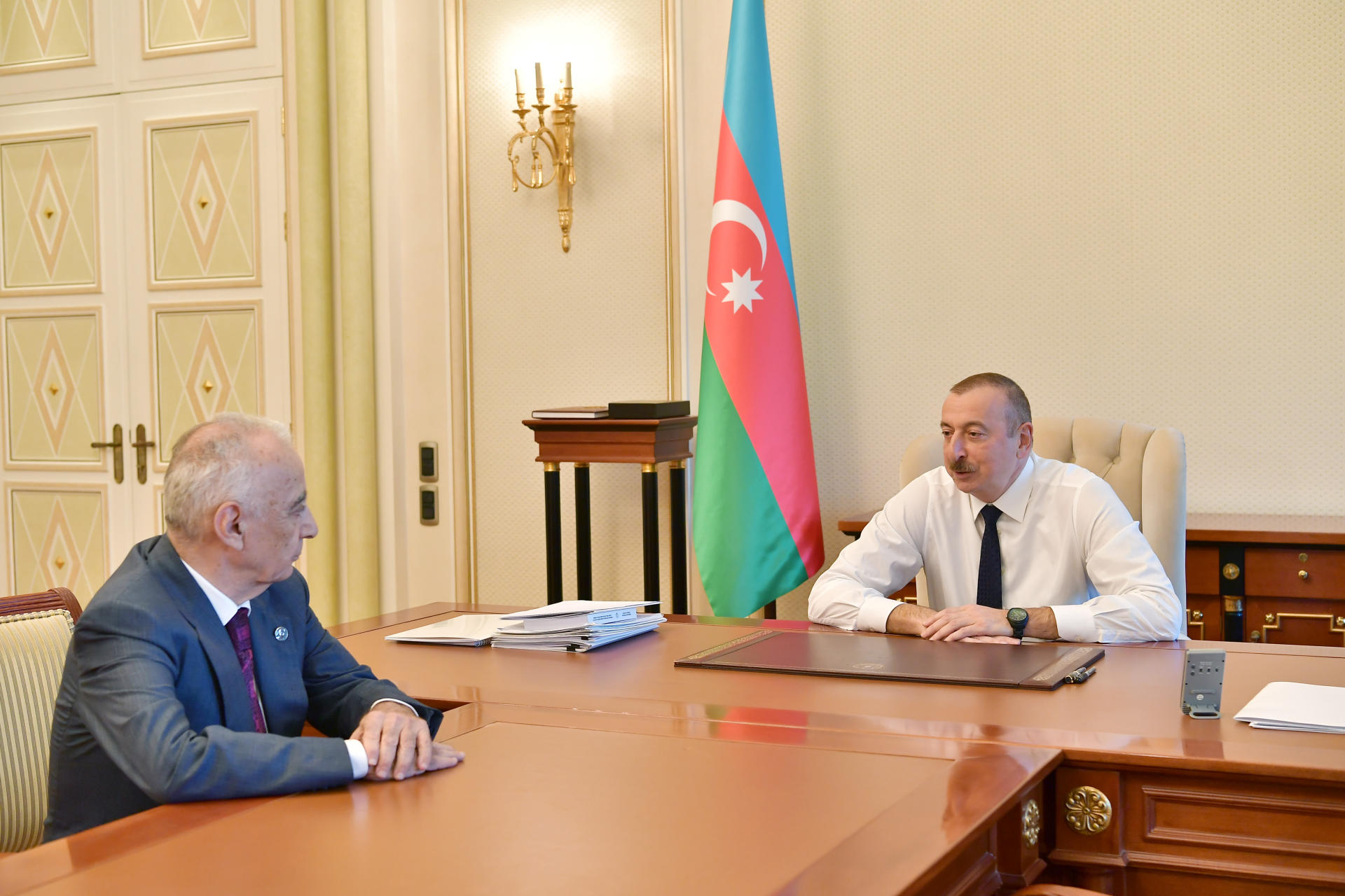 President Ilham Aliyev receives Deputy PM Hajibala Abutalibov as he submitted his resignation