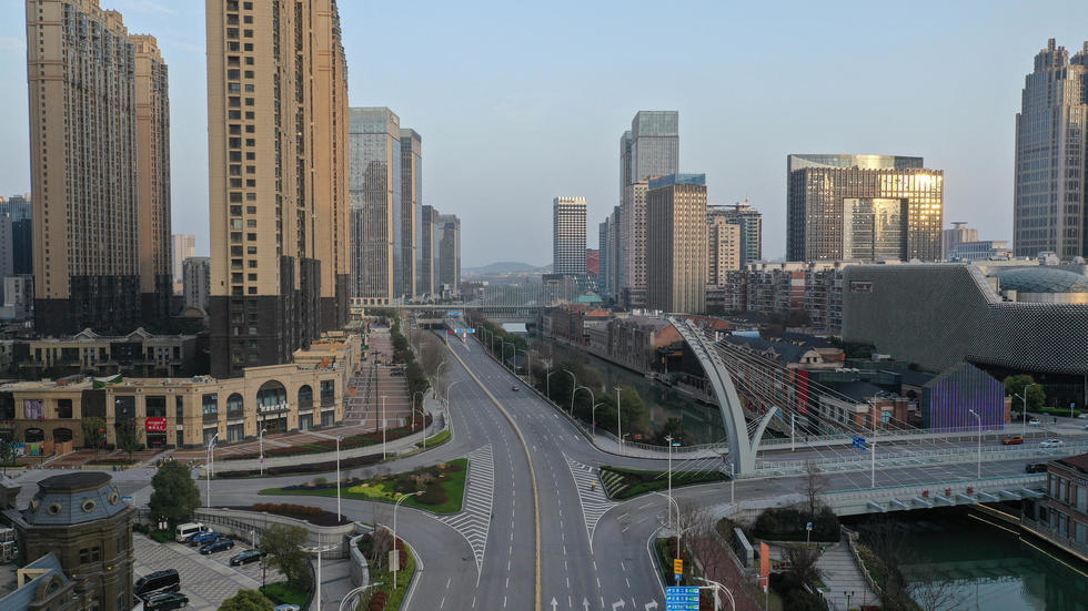 China allows some firms to resume work at virus epicentre