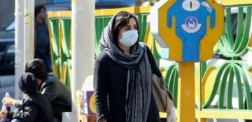 Iran reports 157 new virus deaths, imposes intercity ban