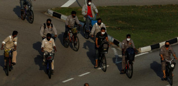 Singapore reports 728 new virus cases in biggest daily jump, total 4,427