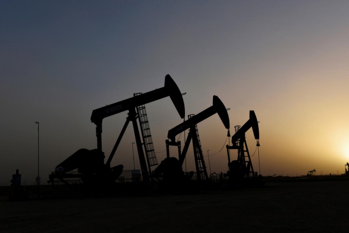 Oil gains as coronavirus lockdowns ease, boosting hopes for demand pickup