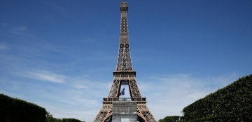 Eiffel Tower reopens after a three-month coronavirus break