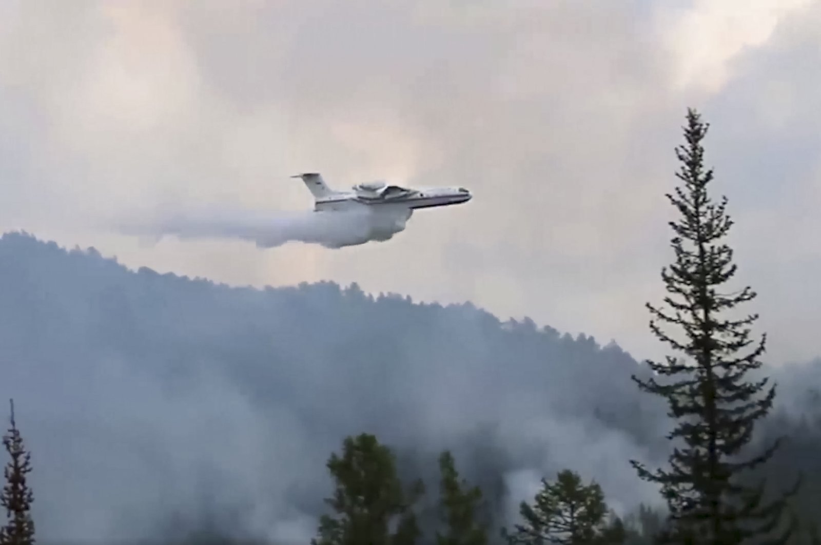 Russia seeds clouds to bring down rain over wildfires raging in Siberia