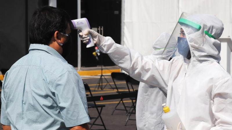 Mexico's COVID-19 death toll exceeds 57,00