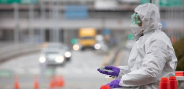 S.Korea extends COVID-19 restrictions as virus spikes