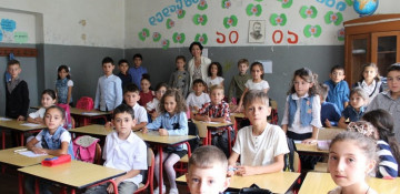 Georgia postpones new school year in major cities