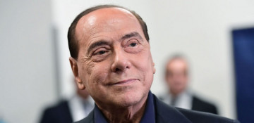 Italy's Berlusconi leaves hospital after virus scare