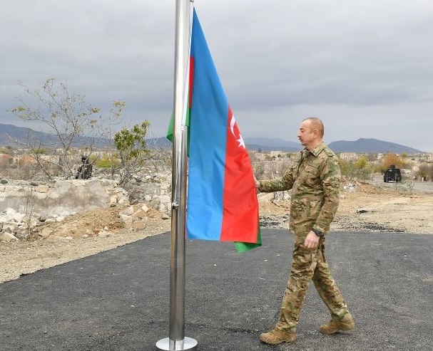 President Ilham Aliyev raises Azerbaijani flag in Aghdam city (PHOTO)