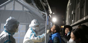 China reports 20 new COVID-19 mainland cases vs 14 a day earlier