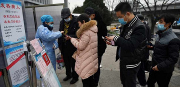 China's capital locks down part of district in coronavirus fight