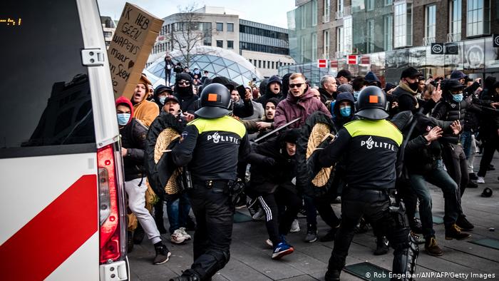 Dutch police detain 240 nationwide as anti-lockdown protests turn violent