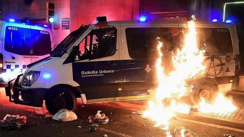 Catalan police arrest 8 in protests for jailed rapper