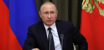 Putin says pandemic in Russia develops downturn, but many challenges remain