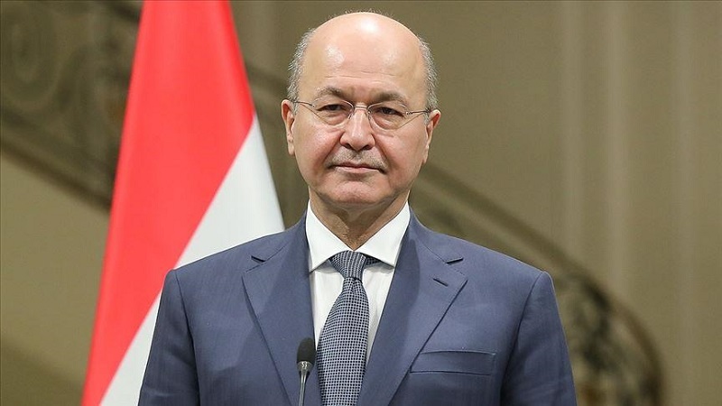 Iraqi president signs decree for early polls in October