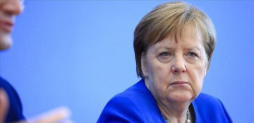 Merkel expects climate change law to go to cabinet in coming week - sources