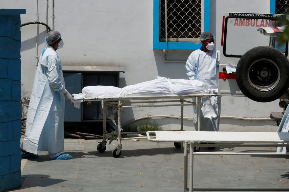 India reports record daily rises in COVID-19 infections, deaths