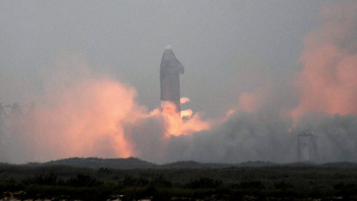 SpaceX successfully lands Mars rocket prototype on fifth try