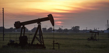 US energy agency revises up oil price forecast for 2021/22