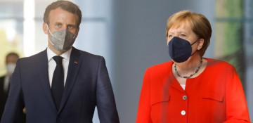 Merkel and Macron urge EU coordination on reopening borders