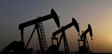 Oil drops as COVID-19 surges threaten fuel demand outlook