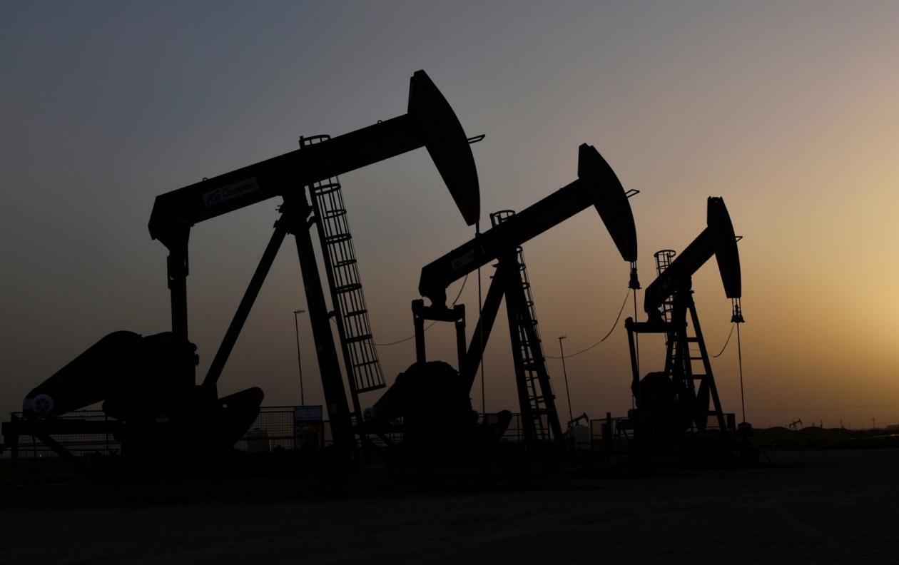 Oil drops as COVID-19 surges threaten fuel demand outlook