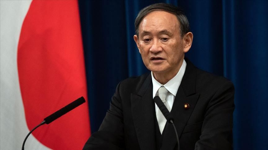 Japan PM warns of closed-door Olympics as virus cases rise