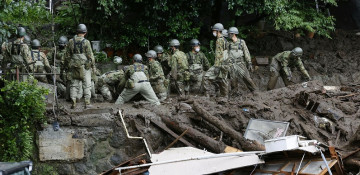 Rescuers in Japan hunt for 80 missing after deadly landslides