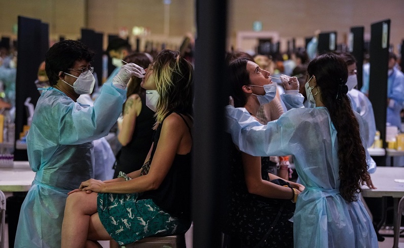 COVID-19 surge prompts new curfews in Spain, measures in France